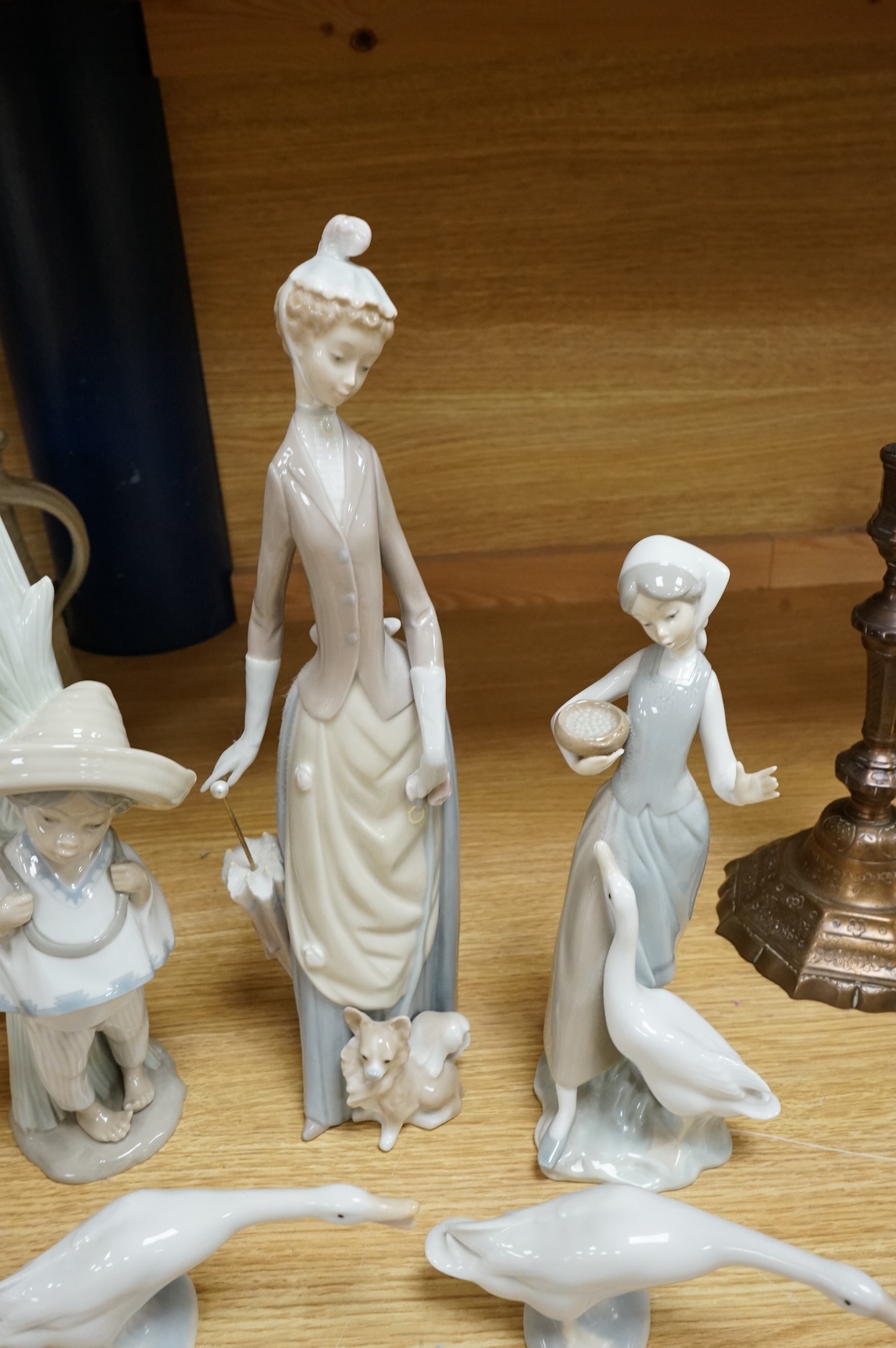 Five Lladro figures and one other, tallest 37cm high